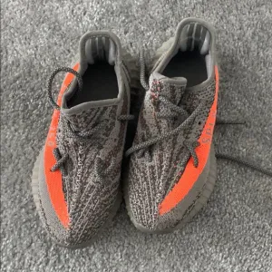 Adidas Gray and Orange Sneakers with Knitted Upper