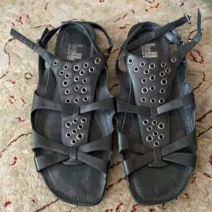 Belle Sigerson Morrison black leather and metal sandals.