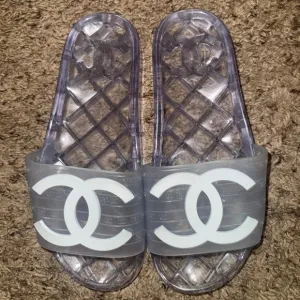 CHANEL Clear Logo Slide Sandals