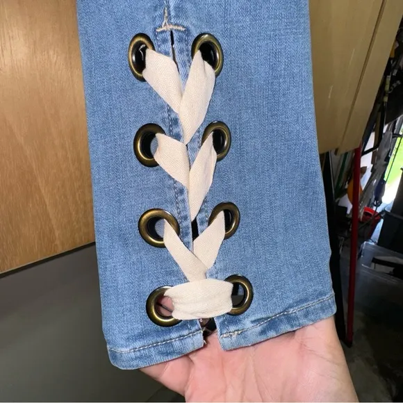 Chico’s So Slimming Lace-Up Hem Girlfriend Ankle Jeans.