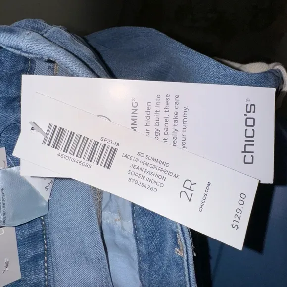 Chico’s So Slimming Lace-Up Hem Girlfriend Ankle Jeans.