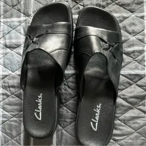 Clarks Low Wedge Black Leather Wedge Slides.EUC Worn Once Sz 10. Floral Cut Out