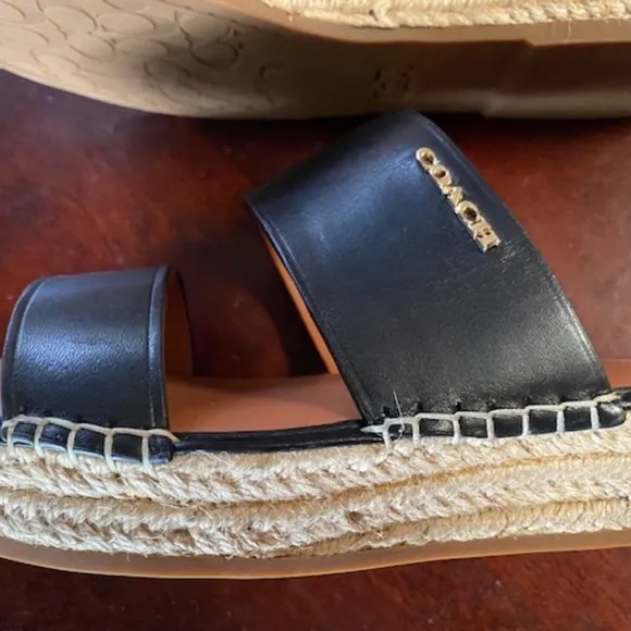 Coach black leather espadrille. slides