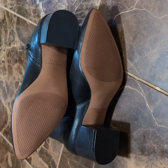 Cole Haan boots..
