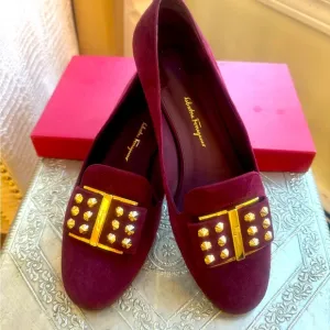 Ferragamo flats in plum suede and gold hardware. Size 8.5