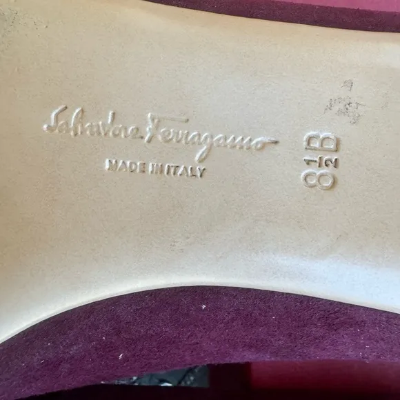 Ferragamo flats in plum suede and gold hardware. Size 8.5
