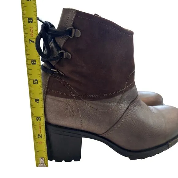 Fly London tie up back, side zip boots