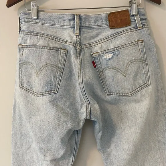 Levi’s 501 Distressed Light Wash Denim Jeans straight leg raw hem