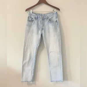 Levi’s 501 Distressed Light Wash Denim Jeans straight leg raw hem