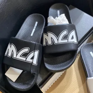 MCQ logo slides (all black)