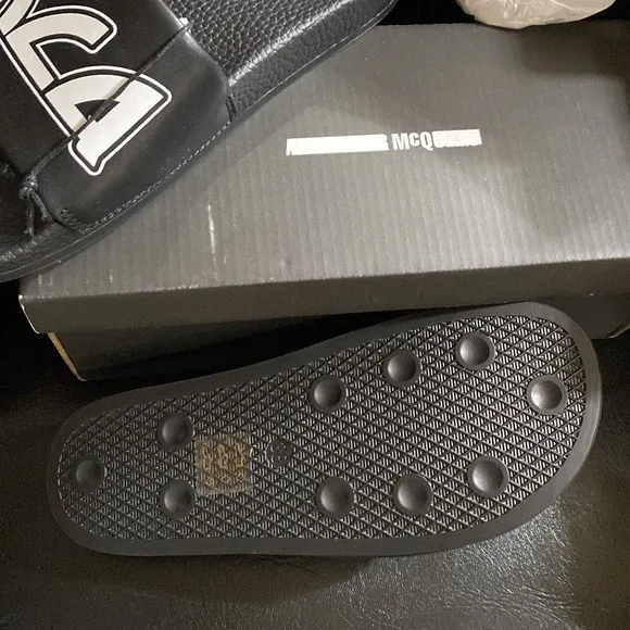 MCQ logo slides (all black)