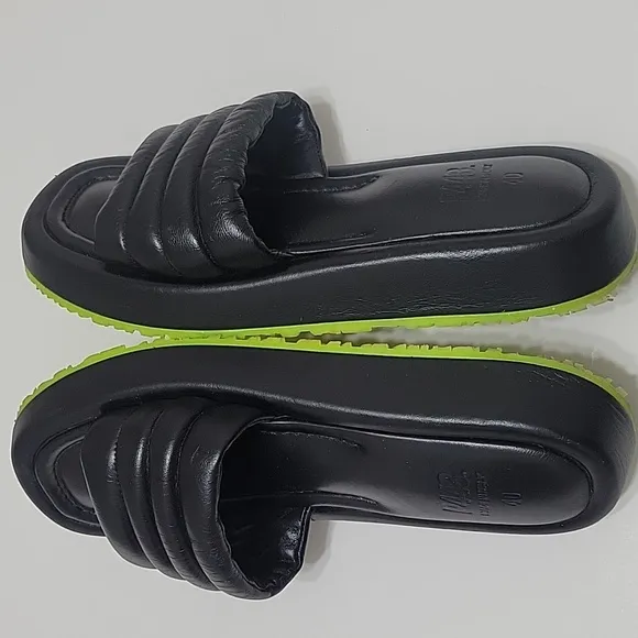 P448 Fergie Black Slipons