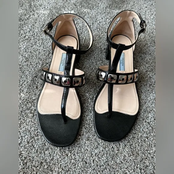 Prada vernice 3 patent leather T-Strap sandals are a size 37.