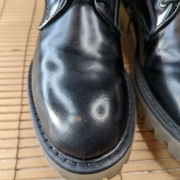 Steve Madden &quot;Berlin&quot; women's sz 7M boots. Black leather. Side zip and lace. Chu