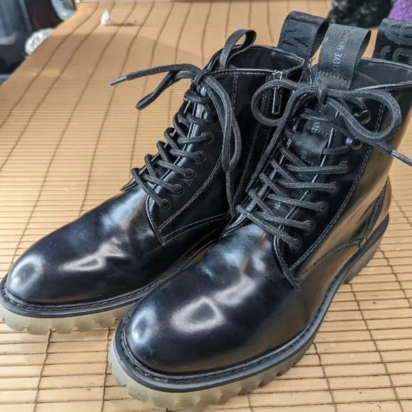 Steve Madden &quot;Berlin&quot; women's sz 7M boots. Black leather. Side zip and lace. Chu